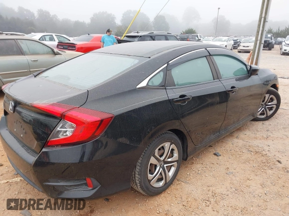 2018 Honda Civic LX with VIN 2HGFC2F55JH595412, listed as a IAAI auction lot 40510936 with 74,359 mi miles and . Bid and sale history available at DreamBid. Image 4.