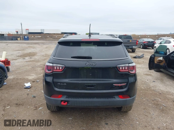 2019 Jeep Compass Trailhawk z VIN 3C4NJDDB5KT618149, wystawiony jako IAAI lot #41959320 z przebiegiem 99 795 mil mil oraz . Historia ofert i sprzedaży dostępna na DreamBid. Obrazek 16.