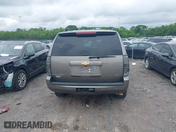 2012 Chevrolet Tahoe LT z VIN 1GNSCBE08CR136971, wystawiony jako IAAI lot #42211242 z przebiegiem 214 910 mil mil oraz . Historia ofert i sprzedaży dostępna na DreamBid. Obrazek 16.