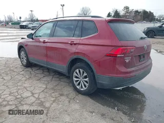 2018 Volkswagen Tiguan S with VIN 3VV1B7AX9JM085312, listed as a IAAI auction lot 41656827 with 122,322 mi miles and . Bid and sale history available at DreamBid. Image 3.