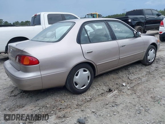 1998 Toyota Corolla VE z VIN 2T1BR18EXWC015480, wystawiony jako IAAI lot #41959316 z przebiegiem 224 304 mil mil oraz . Historia ofert i sprzedaży dostępna na DreamBid. Obrazek 4.