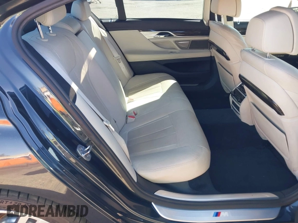 2016 BMW 7 Series 740i with VIN WBA7E2C52GG548048, listed as a IAAI auction lot 41701806 with 72,680 mi miles. Bid and sale history available at carsss.com. Image 8.