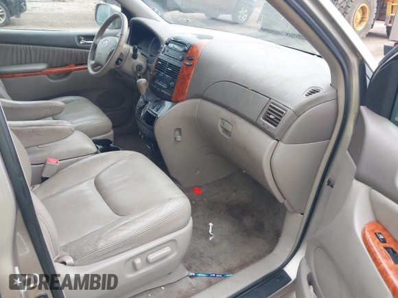 2008 Toyota Sienna XLE with VIN 5TDZK22C98S099673, listed as a IAAI auction lot 42661903 with 205,714 mi miles and . Bid and sale history available at DreamBid. Image 5.