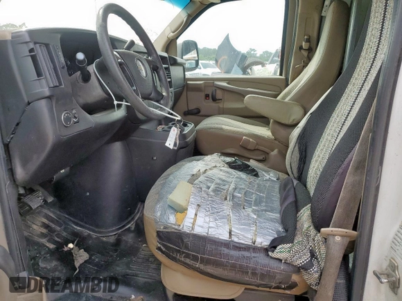 2010 Chevrolet Express Cargo with VIN 1GCUGADX1A1172060, listed as a Copart auction lot 58779905 with 456,288 mi miles and Salvage title. Bid and sale history available at DreamBid. Image 7.