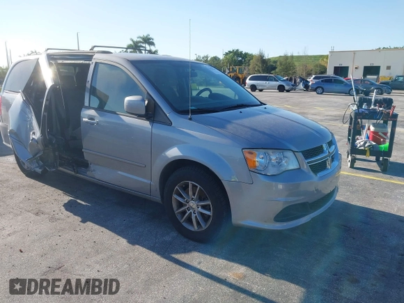 2015 Dodge Grand Caravan SXT with VIN 2C4RDGCG3FR592098, listed as a IAAI auction lot 42038665 with 104,092 mi miles and . Bid and sale history available at DreamBid. Image 1.