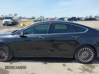 2015 Ford Fusion Titanium with VIN 3FA6P0K91FR168665, listed as a IAAI auction lot 41852403 with 138,711 mi miles. Bid and sale history available at carsss.com. Image 14.