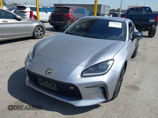 2023 Toyota GR86 Premium with VIN JF1ZNBF15P8759278, listed as a IAAI auction lot 41765684 with 21,300 mi miles. Bid and sale history available at carsss.com. Image 2.