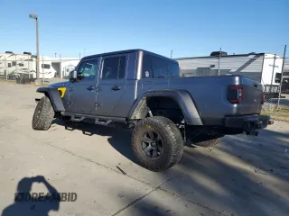 2021 Jeep Gladiator Rubicon с VIN 1C6JJTBM4ML594204, выставлен на аукционе Copart как лот 83998224 с пробегом 25 852 миль миль и Списание • Salvage title. История ставок и продаж доступна на DreamBid. Изображение 2.