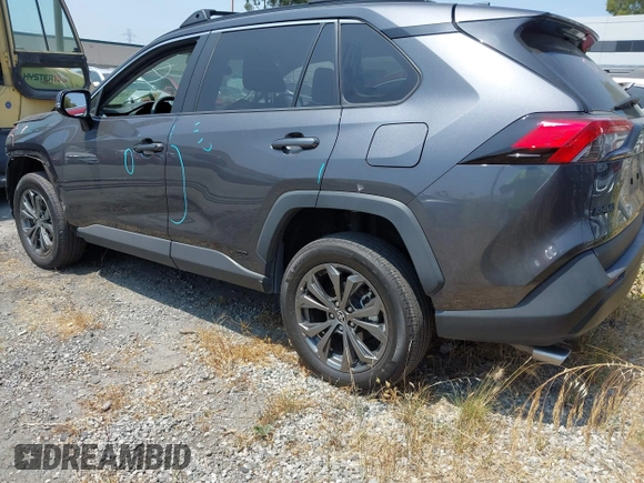 2023 Toyota RAV4 Hybrid XLE Premium with VIN 4T3B6RFV9PU117919, listed as a IAAI auction lot 42528322 with 27,236 mi miles and . Bid and sale history available at DreamBid. Image 3.