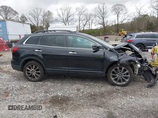 2015 Mazda CX-9 Grand Touring with VIN JM3TB3DV8F0462823, listed as a IAAI auction lot 41863462 with 91,043 mi miles. Bid and sale history available at carsss.com. Image 13.