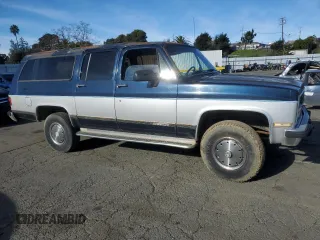 1991 Chevrolet Suburban z VIN 1GNGV26K1MF104219, wystawiony jako Copart lot #87527045 z przebiegiem 189 345 mil mil oraz Czysty tytuł • Clean title. Historia ofert i sprzedaży dostępna na DreamBid. Obrazek 4.