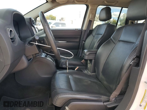 2016 Jeep Compass High Altitude with VIN 1C4NJDEB3GD797691, listed as a Copart auction lot 80340604 with 95,404 mi miles and Salvage title. Bid and sale history available at DreamBid. Image 7.