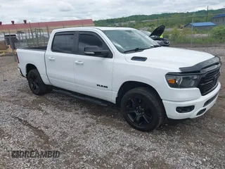 2021 Ram 1500 Big Horn with VIN 1C6SRFFT0MN655651, listed as a IAAI auction lot 42245149 with 39,366 mi miles and . Bid and sale history available at DreamBid. Image 1.