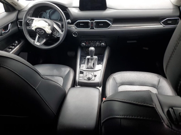 2019 Mazda CX-5 Grand Touring with VIN JM3KFBDM4K0676946, listed as a Copart auction lot 61040465 with Not provided miles and Salvage title. Bid and sale history available at DreamBid. Image 8.