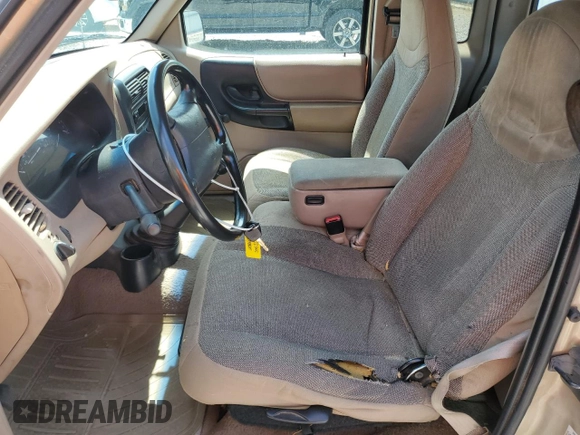 2000 Ford Ranger XL z VIN 1FTYR14V0YTA89549, wystawiony jako Copart lot #55728585 z przebiegiem 179 336 mil mil oraz Szkoda całkowita • Salvage title. Historia ofert i sprzedaży dostępna na DreamBid. Obrazek 7.