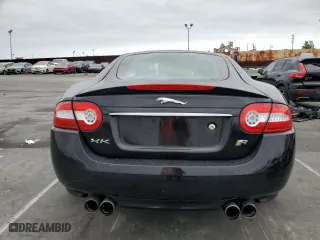 2013 Jaguar XK with VIN SAJWA4DC6DMB50779, listed as a Copart auction lot 50687705 with 106,826 mi miles and Clean Title. Bid and sale history available at carsss.com. Image 6.