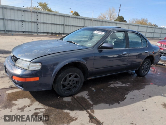 1997 Nissan Maxima GXE with VIN JN1CA21D0VT201140, listed as a Copart auction lot 52230495 with 286,440 mi miles and Clean title. Bid and sale history available at DreamBid. Image 1.