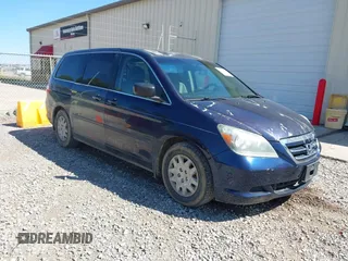 2007 Honda Odyssey LX with VIN 5FNRL38247B082154, listed as a IAAI auction lot 41822975 with 178,478 mi miles. Bid and sale history available at carsss.com. Image 1.