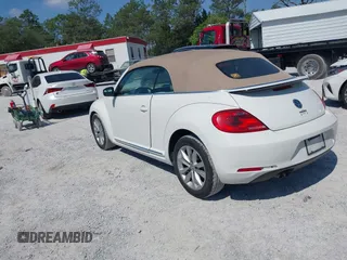 2013 Volkswagen Beetle 2.5L with VIN 3VW5P7AT3DM811617, listed as a IAAI auction lot 42055769 with 93,810 mi miles and . Bid and sale history available at DreamBid. Image 3.