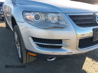 2010 Volkswagen Touareg VR6 with VIN WVGBF7A92AD001704, listed as a IAAI auction lot 41751316 with 80,597 mi miles and . Bid and sale history available at DreamBid. Image 6.
