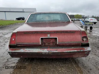 1981 Chevrolet Monte Carlo z VIN 1G1AZ37K7BB423127, wystawiony jako Copart lot #51288275 z przebiegiem 86 962 mil mil oraz Tytuł czysty. Historia ofert i sprzedaży dostępna na DreamBid. Obrazek 6.