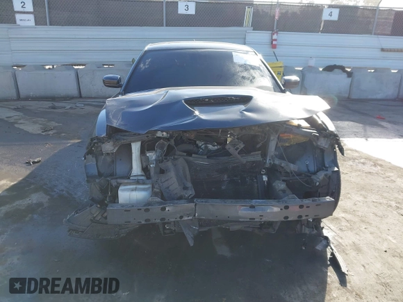 2019 Dodge Charger Scat Pack with VIN 2C3CDXGJ7KH588717, listed as a IAAI auction lot 41694673 with Not Provided miles and . Bid and sale history available at DreamBid. Image 6.