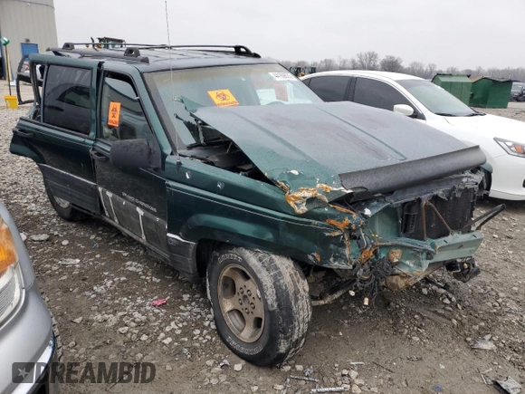 1997 Jeep Grand Cherokee Laredo with VIN 1J4GZ58S5VC720174, listed as a Copart auction lot 44169635 with Not provided miles and Salvage title. Bid and sale history available at DreamBid. Image 4.