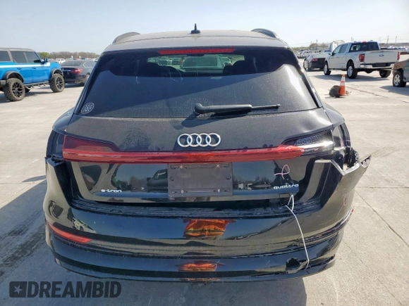 2022 Audi e-tron Premium with VIN WA1AAAGE7NB027856, listed as a Copart auction lot 49494955 with 53,947 mi miles and Salvage Title. Bid and sale history available at DreamBid. Image 6.