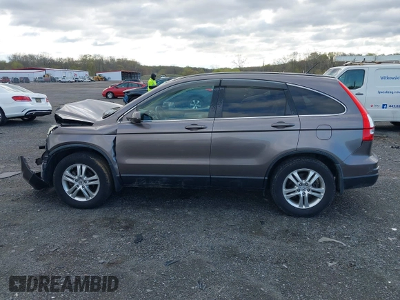 2011 Honda CR-V EX-L with VIN 5J6RE3H7XBL042313, listed as a IAAI auction lot 42034339 with 166,973 mi miles. Bid and sale history available at carsss.com. Image 14.