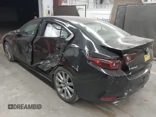 2023 Mazda 3 S Preferred with VIN 3MZBPACM5PM369790, listed as a IAAI auction lot 41612983 with 9,789 mi miles and . Bid and sale history available at DreamBid. Image 3.