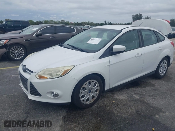 2012 Ford Focus SE with VIN 1FAHP3F25CL239383, listed as a IAAI auction lot 41656033 with 127,011 mi miles and . Bid and sale history available at DreamBid. Image 2.
