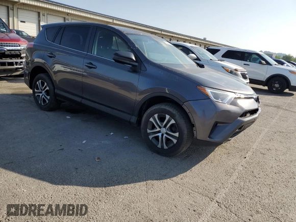 2018 Toyota RAV4 LE with VIN JTMBFREV5JJ736492, listed as a Copart auction lot 63794335 with 97,374 mi miles and Clean title. Bid and sale history available at DreamBid. Image 4.