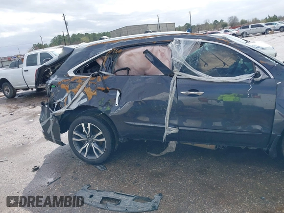 2019 Acura MDX Advance z VIN 5J8YD3H85KL002610, wystawiony jako IAAI lot #41719527 z przebiegiem Nie podano mil oraz . Historia ofert i sprzedaży dostępna na DreamBid. Obrazek 13.