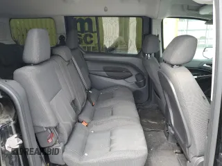 2016 Ford Transit Connect XLT z VIN NM0GE9F74G1272819, wystawiony jako Copart lot #54015425 z przebiegiem 63 364 mil mil oraz Szkoda całkowita • Salvage title. Historia ofert i sprzedaży dostępna na DreamBid. Obrazek 11.