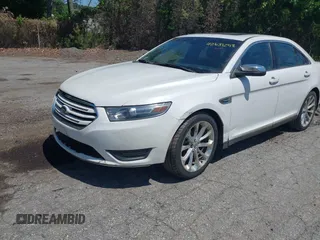 2013 Ford Taurus Limited with VIN 1FAHP2J84DG187311, listed as a IAAI auction lot 42631258 with 112,805 mi miles and . Bid and sale history available at DreamBid. Image 2.