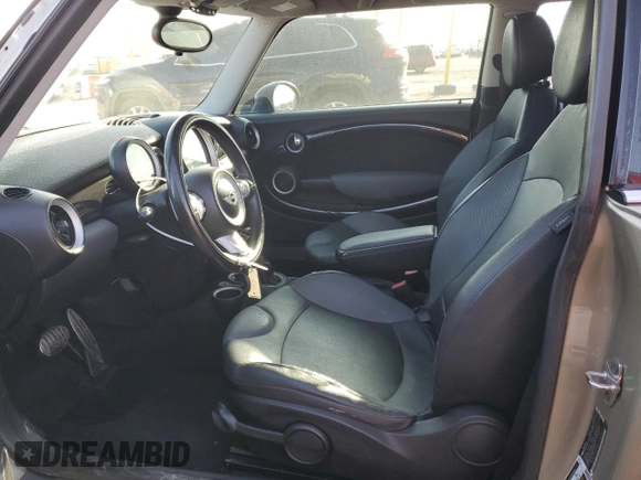 2009 MINI Hardtop S with VIN WMWMF73529TW82713, listed as a Copart auction lot 51152035 with 170,954 mi miles and Salvage title. Bid and sale history available at DreamBid. Image 7.