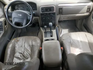 2002 Jeep Grand Cherokee with VIN 1J8GW48N42C183028, listed as a Copart auction lot 66677114 with 230,146 mi miles and Salvage title. Bid and sale history available at DreamBid. Image 8.