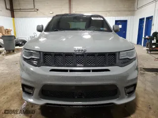 2021 Jeep Grand Cherokee SRT with VIN 1C4RJFDJ5MC667774, listed as a Copart auction lot 42484435 with 43,387 mi miles and Salvage Title. Bid and sale history available at carsss.com. Image 5.