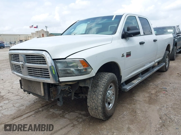 2012 Ram 2500 ST z VIN 3C6UD5HL6CG335854, wystawiony jako IAAI lot #42102244 z przebiegiem 187 838 mil mil oraz . Historia ofert i sprzedaży dostępna na DreamBid. Obrazek 18.