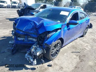 2020 Honda Civic Si with VIN 2HGFC1E59LH707904, listed as a IAAI auction lot 41621372 with 112,077 mi miles and . Bid and sale history available at DreamBid. Image 18.