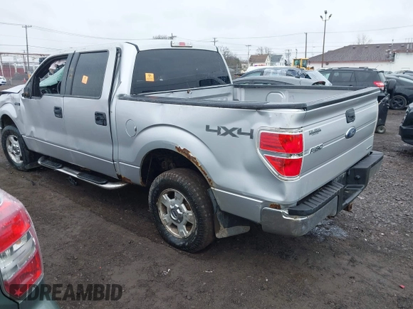 2014 Ford F-150 XL with VIN 1FTFW1EFXEKF79876, listed as a IAAI auction lot 42011856 with 161,366 mi miles and . Bid and sale history available at carsss.com. Image 3.