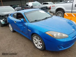 2008 Hyundai Tiburon GT with VIN KMHHN66FX8U282926, listed as a IAAI auction lot 41959023 with 119,414 mi miles. Bid and sale history available at carsss.com. Image 13.