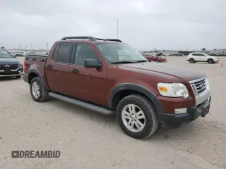2010 Ford Explorer Sport Trac XLT z VIN 1FMEU3BE2AUF07380, wystawiony jako Copart lot #52099905 z przebiegiem 149 856 mil mil oraz Szkody całkowita. Historia ofert i sprzedaży dostępna na DreamBid. Obrazek 4.