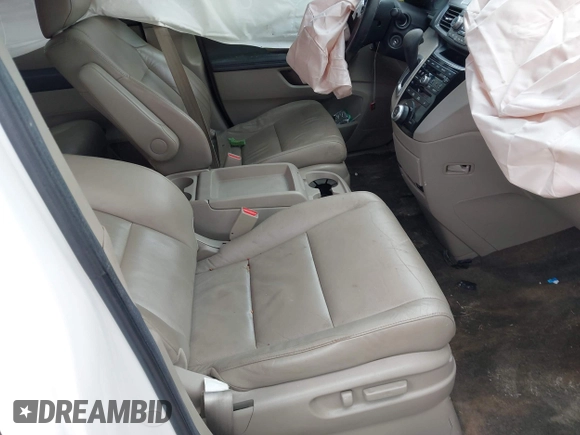 2012 Honda Odyssey EX-L with VIN 5FNRL5H67CB082903, listed as a IAAI auction lot 42015904 with 208,300 mi miles and . Bid and sale history available at carsss.com. Image 5.