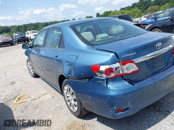 2013 Toyota Corolla L with VIN 5YFBU4EE5DP210100, listed as a IAAI auction lot 40178941 with 103,000 mi miles and . Bid and sale history available at DreamBid. Image 3.