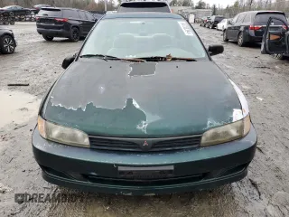 1998 Mitsubishi Mirage DE z VIN JA3AY26A2WU042095, wystawiony jako Copart lot #84700394 z przebiegiem 124 362 mil mil oraz Czysty tytuł • Clean title. Historia ofert i sprzedaży dostępna na DreamBid. Obrazek 5.