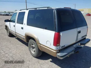 1999 Chevrolet Suburban with VIN 3GNEC16R6XG266922, listed as a IAAI auction lot 41992370 with 370,843 mi miles. Bid and sale history available at carsss.com. Image 3.