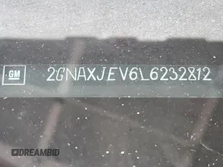 2020 Chevrolet Equinox LT z VIN 2GNAXJEV6L6232812, wystawiony jako IAAI lot #42516876 z przebiegiem 98 451 mil mil oraz . Historia ofert i sprzedaży dostępna na DreamBid. Obrazek 1.