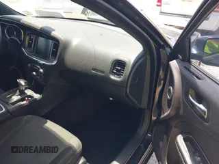 2015 Dodge Charger SXT with VIN 2C3CDXHG2FH852208, listed as a IAAI auction lot 42120021 with 156,486 mi miles and . Bid and sale history available at DreamBid. Image 5.