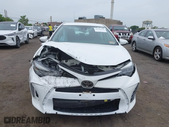 2017 Toyota Corolla L z VIN 2T1BURHE8HC787010, wystawiony jako IAAI lot #42366723 z przebiegiem 104 805 mil mil oraz . Historia ofert i sprzedaży dostępna na DreamBid. Obrazek 12.